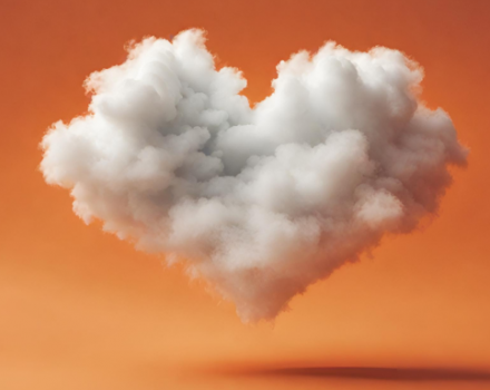 nuage en coton sous forme de coeur sur fond orange