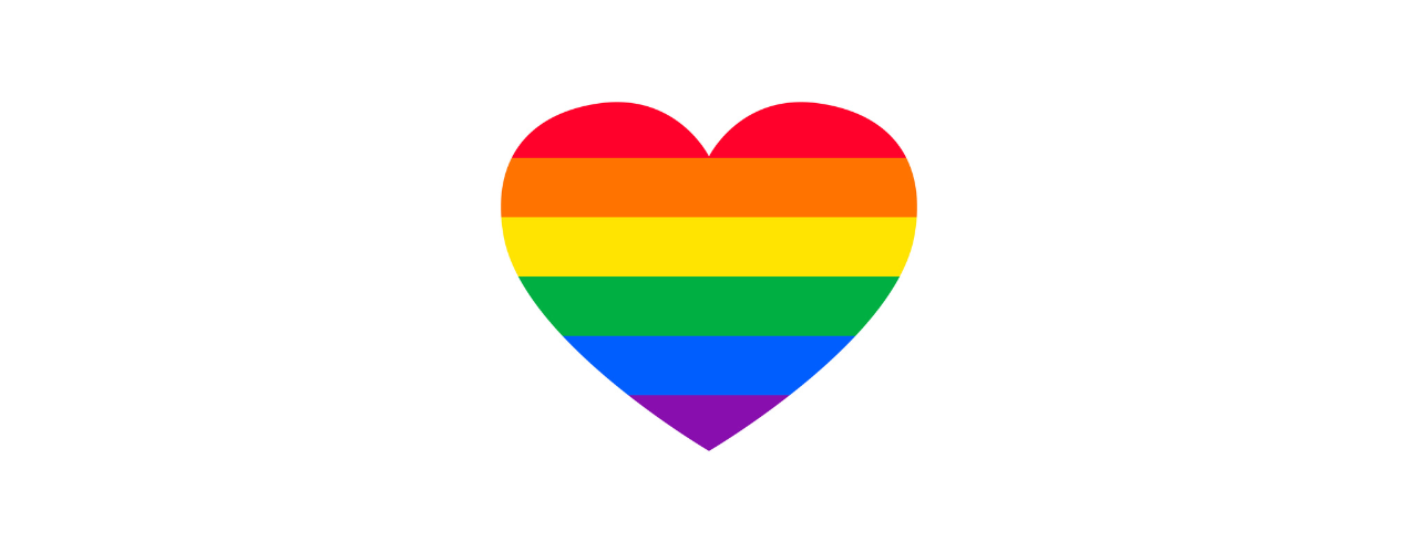 coeur avec le drapeau arc en ciel sur fond blanc